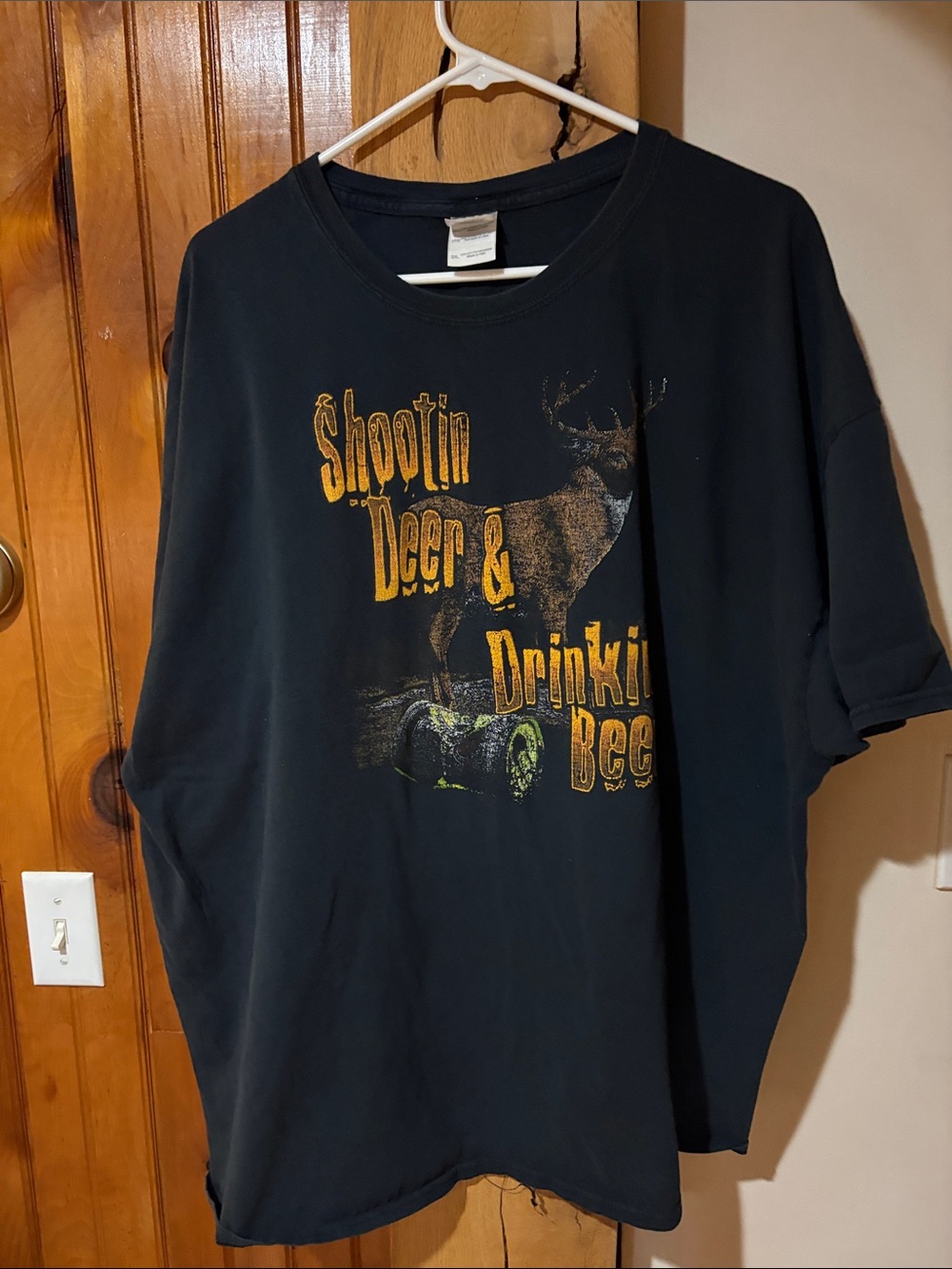 Gildan Black Short-Sleeve Graphic Tee with Yellow Text & Brown Deer